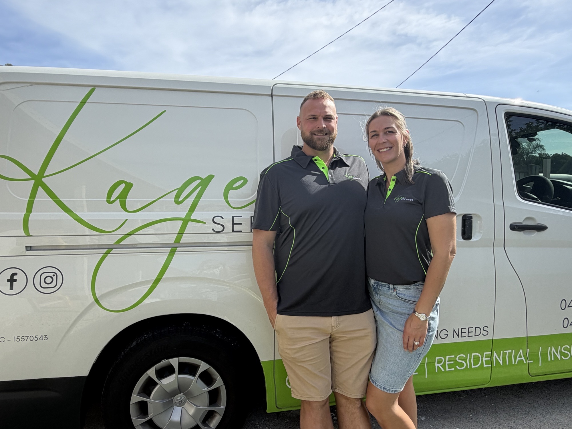 Geoff and Kylie of KAGE Services in front of the company van